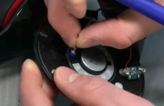 Removing the microphone from the speaker housing