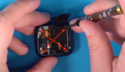 Remove the screw in each corner of the Apple Watch Series 7