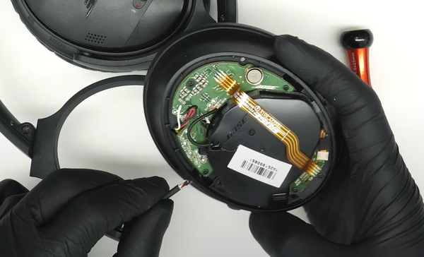 Threading the main wire into the ear cup