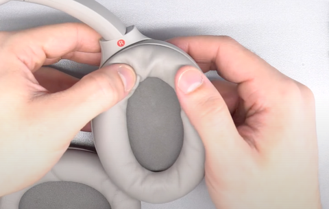 Press the ear pad into its place all around the ear pad until you hear the snap of the connectors