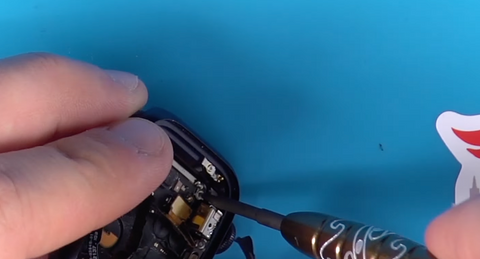 Installing the two other corner screws in the Apple Watch Series 7