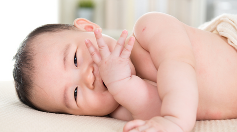 Top signs of teething biting fingers