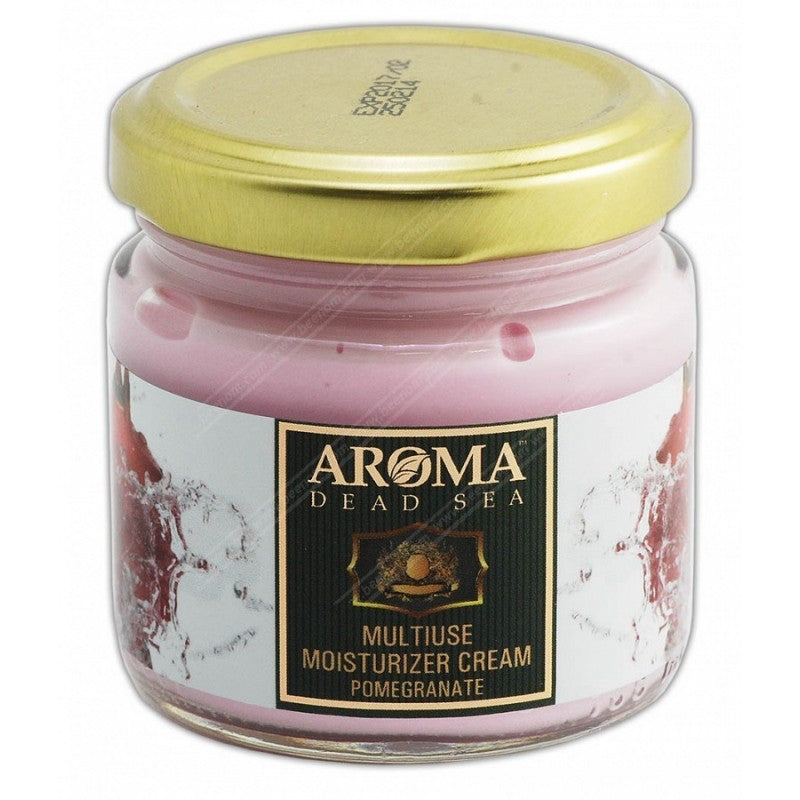 קרם לחות רב שימושי מבית Aroma, בניחוח רימון, באריזת זכוכית עם מכסה זהב. הקרם, בצבע ורדרד, מכיל 110 מ