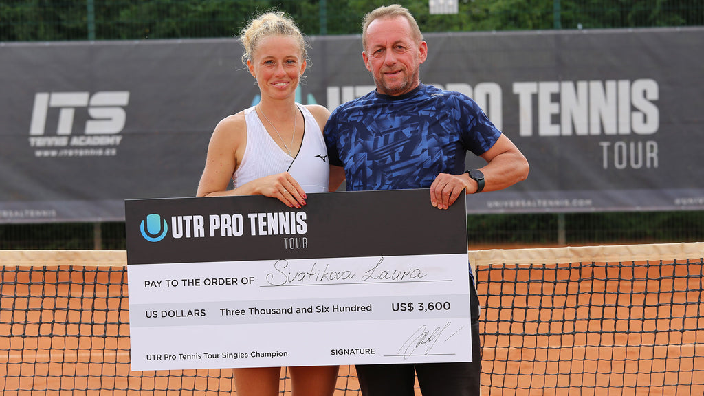 Photo of Laura Svatikova of Slovakia holding her winner's check from a recent PTT event