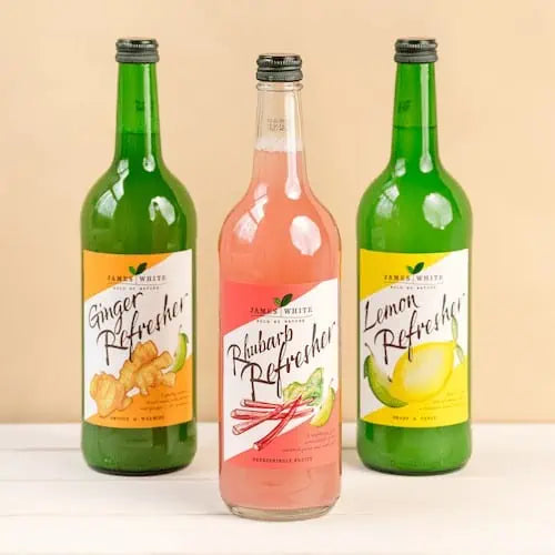 Three refresher bottles of juice- ginger, rhubarb and lemon