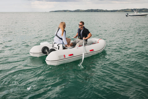 Rowing is easy on a True Kit Navigator inflatable catamaran