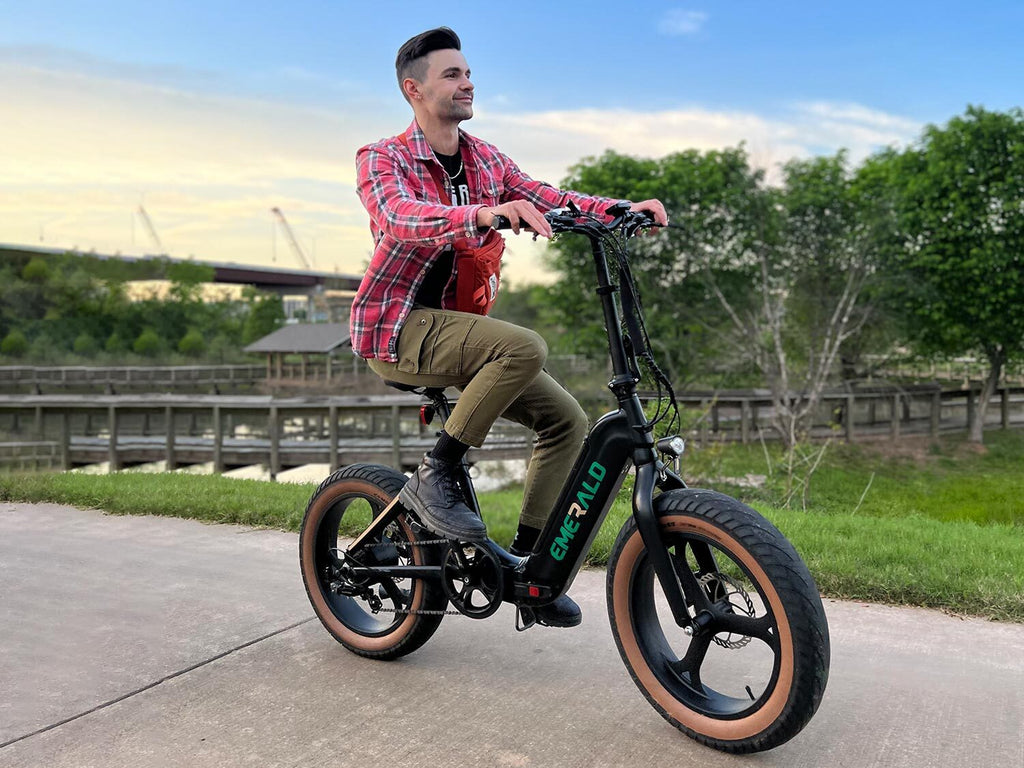 Man taking a relaxing ride on the Emerald Fold ebike
