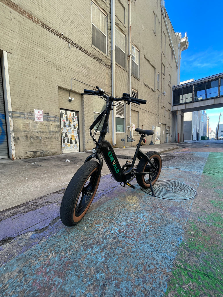 Emerald ebike parked in an alley