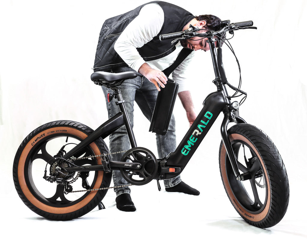 Man removing Emerald Ebike battery