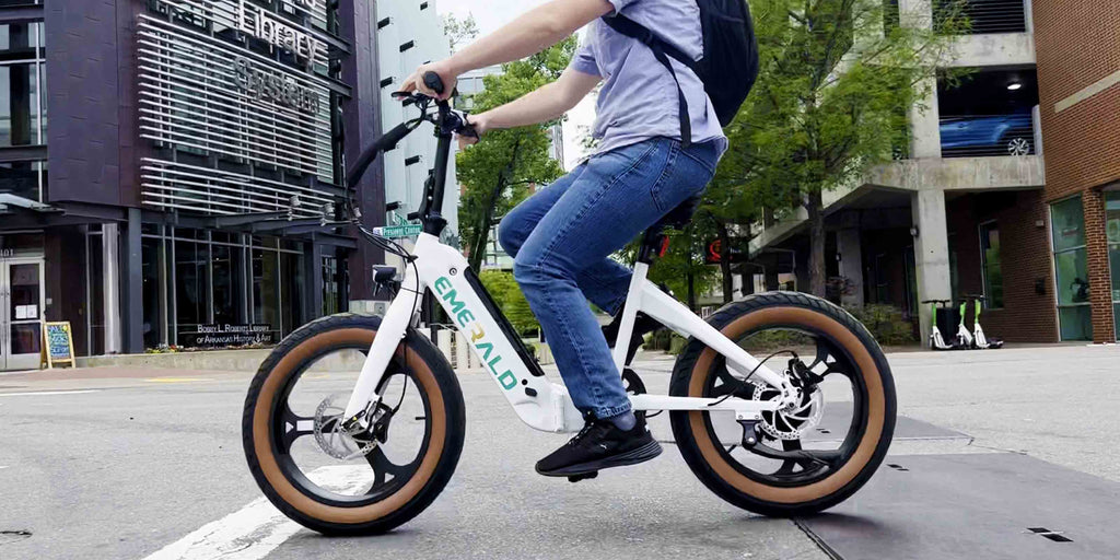 College student riding Emerald Ebike to campus