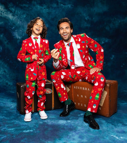Man and boy wearing red Christmas suit