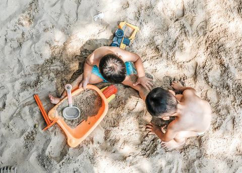 kids building a sand castle