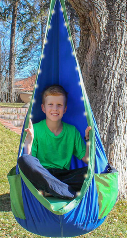 young boy swinging