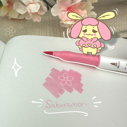 A photo of Mizzy trying out a Shikiori pen!