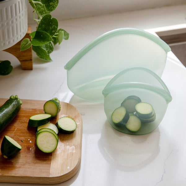 Green silicone food storage containers: small and large