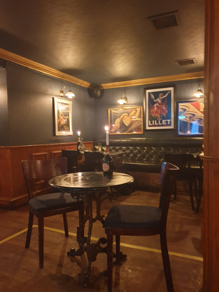 Vintage posters on walls and interior of Bon Vivant