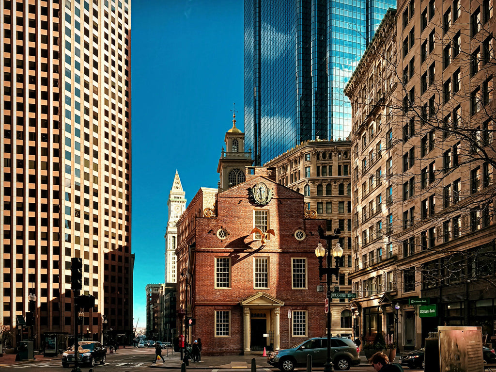 Old buildings contrasted with modern skyscrapers along the Freedom Trail in Boston.