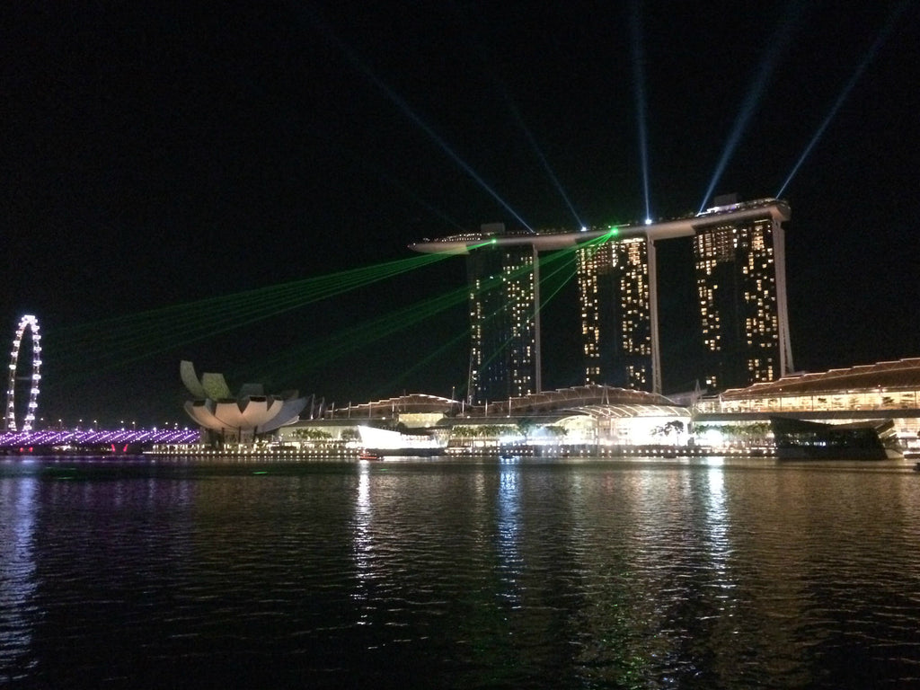 Marina Bay Sands Light Show at night from across the river.
