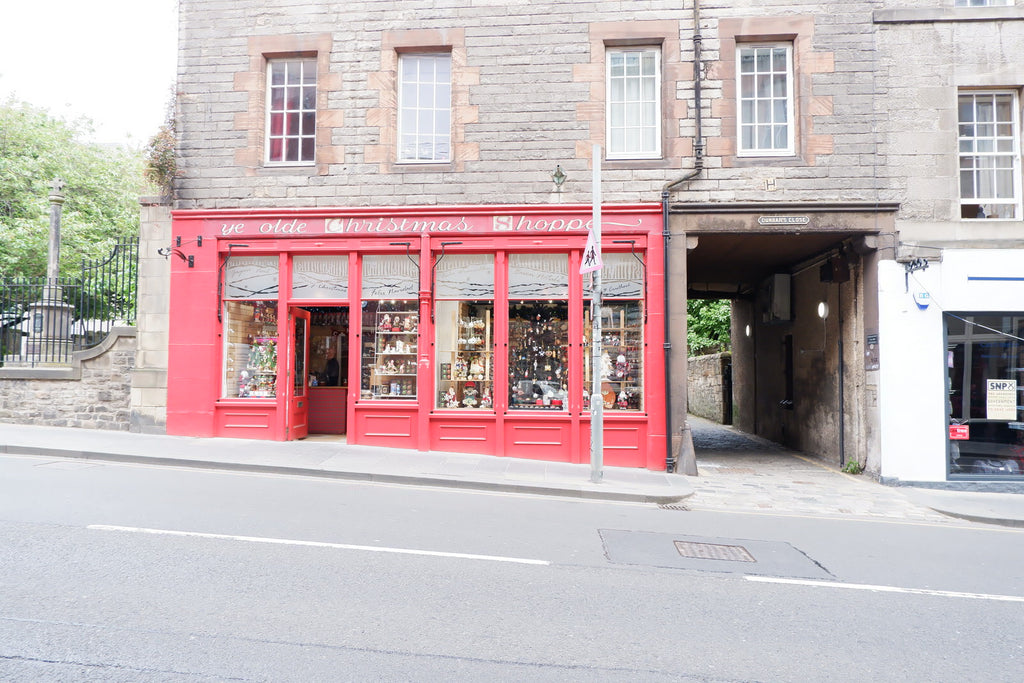 Red shopfront of Ye Olde Christmas Shoppe along the Royal Mile, Edinburgh