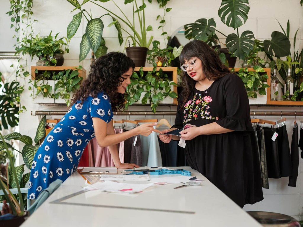 Women managing an eco-friendly clothing store