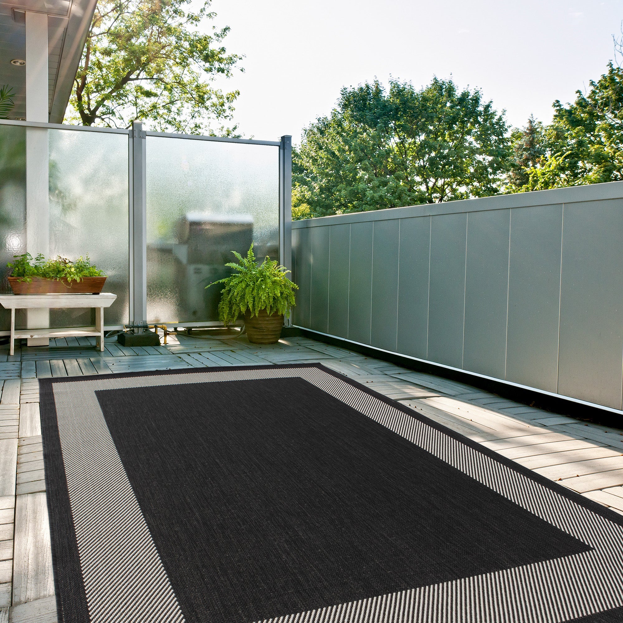 Ecology Collection Outdoor Rugs in Black
