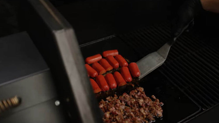 Image of Place the diced bacon and hot links on the griddle....