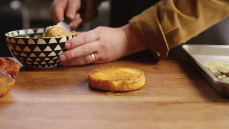 Image of Toast the buns in the butter until golden brown.