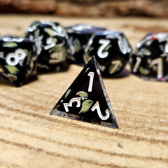 Tabletop dominion moondrop d4 dice on wooden background