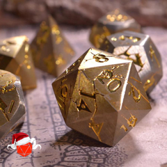 Plated prisoner gold cracked metal dice set for dungeons and dragons on map background