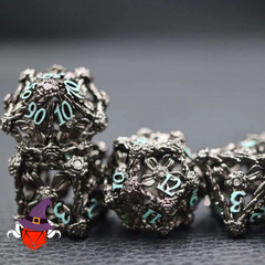 Nightbloom Hollow Metal 7-Piece Dice Set featured on a grey background