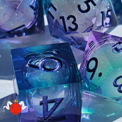 Purple and Blue Jester Liquid Core Dice Set on a white background