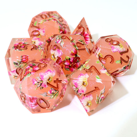 Peach tea layered resin dice set on white background