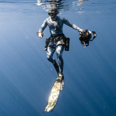 Free diver with LEFEET S1 Pro Underwater scooter dual leg booster mount.