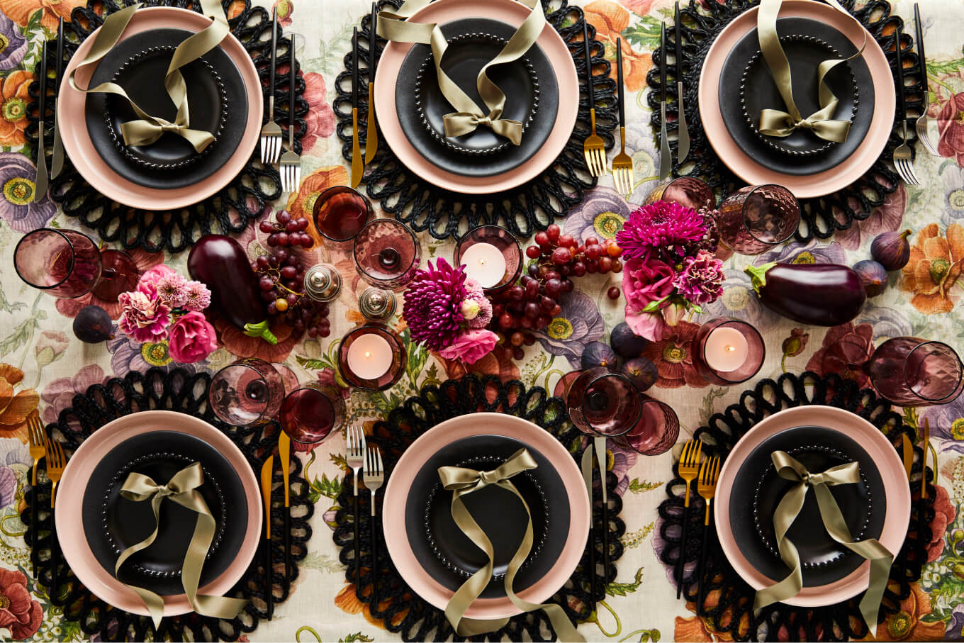 Autumnal Halloween table styling with decadent details of black, pink, purple and gold crockery and glassware from The Social Kitchen
