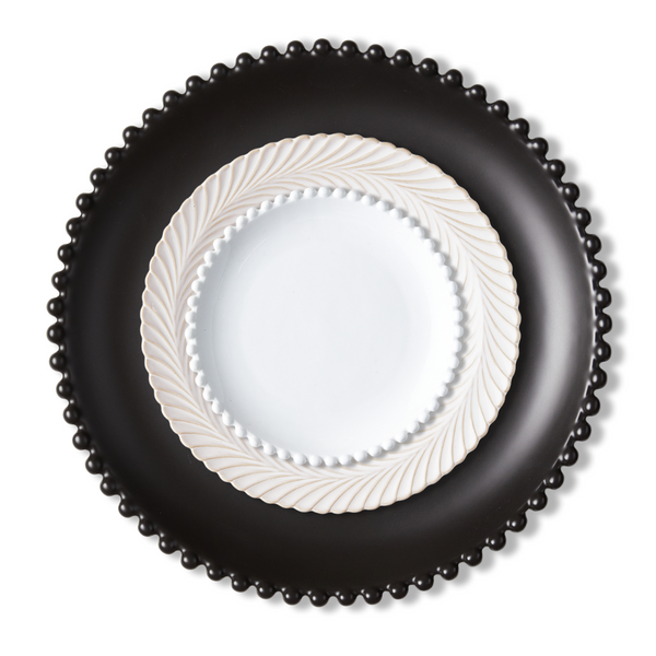 Black Bead Charger Plate, Ivory Braid Dinner Plate and the White Bead Bread Plate, representing the interplay between light and shadow in Swift's Fortnight music video.