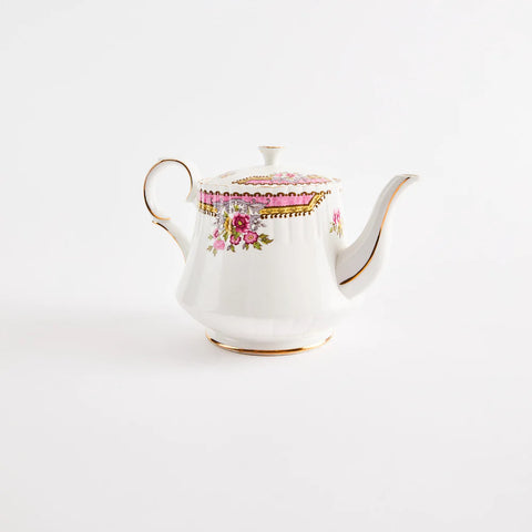 White teapot with pink floral and gold rim