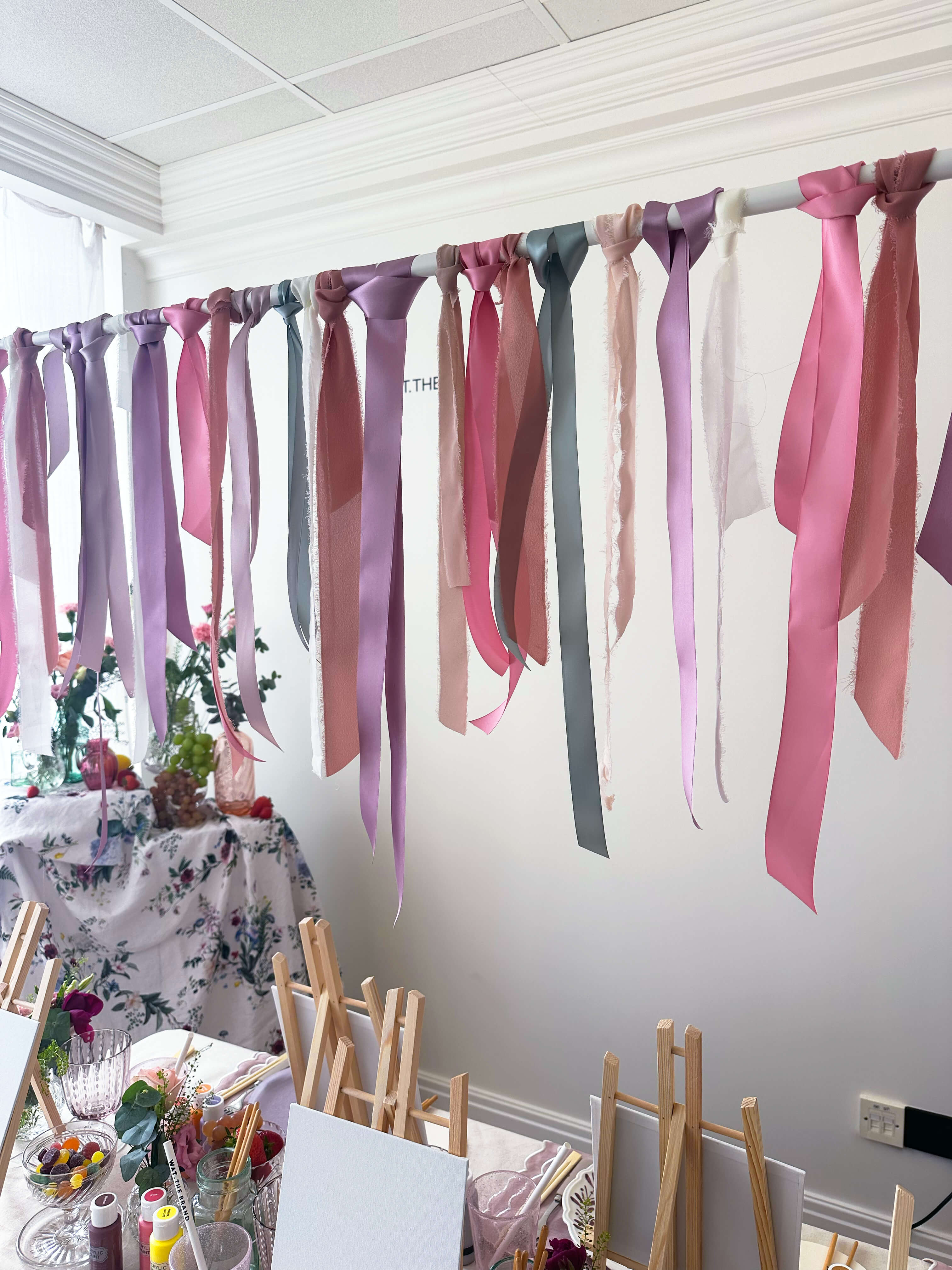 Ribbons hanging loosely over tablescape