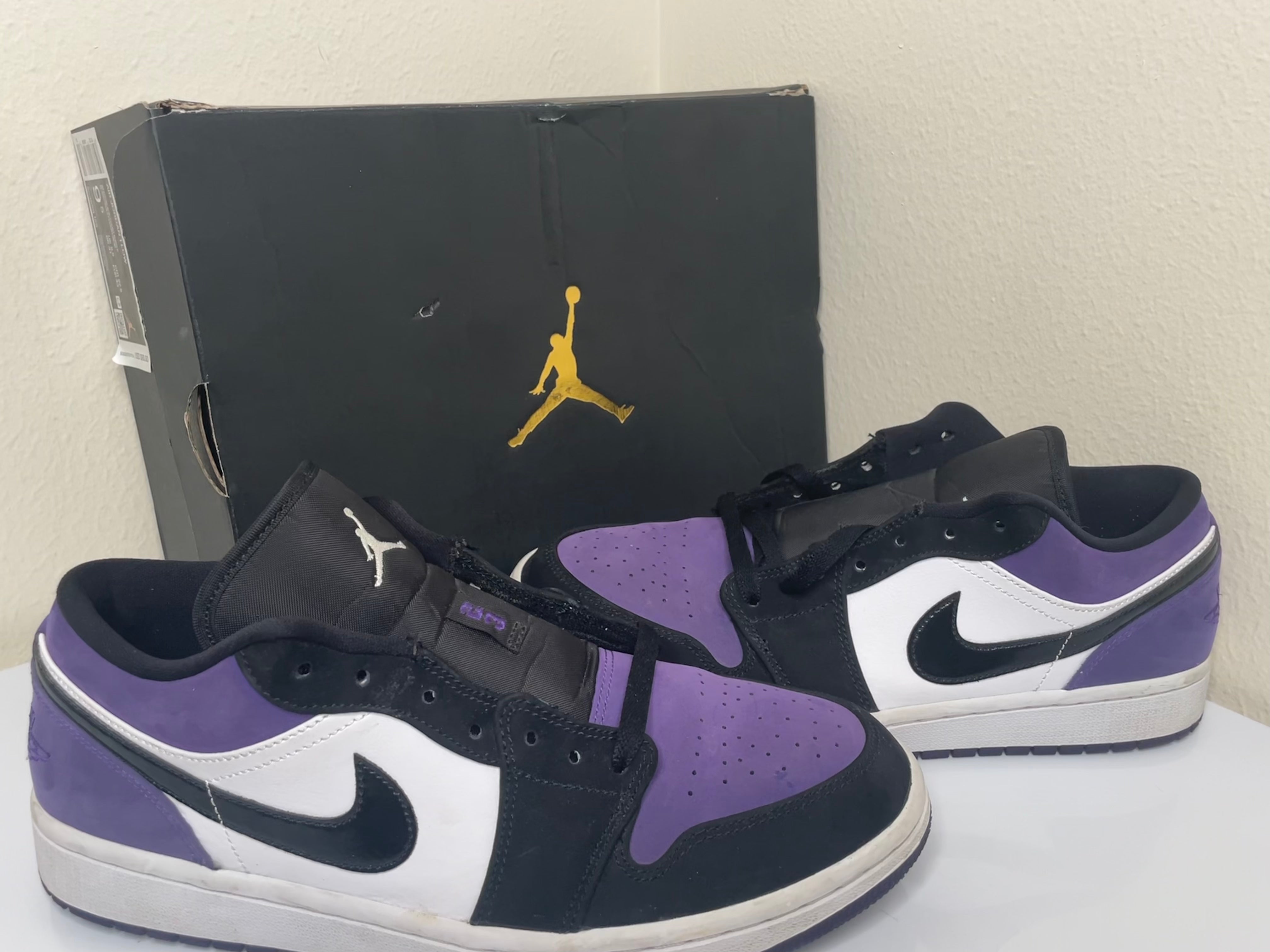 court purple jordan 1 low on feet