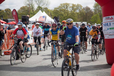 A group of cyclist ride in the Tour de Cure for diabetes