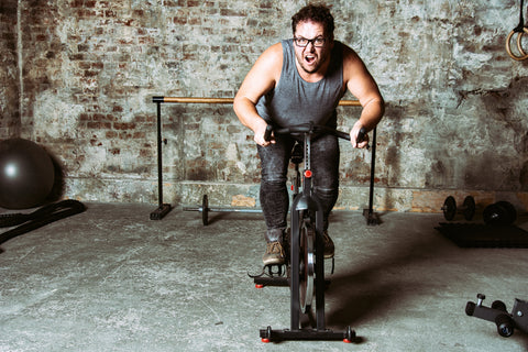 man rides stationary bike to help his diabetes