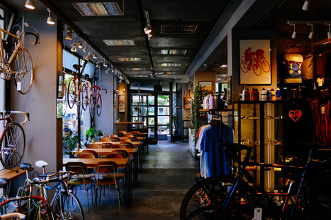 cute bike repair shop with cafe and social space