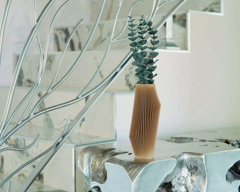 Beige vase with eucalyptus by Woodland Pulse