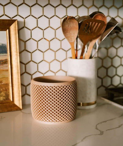 Beige VISION geometric planter.