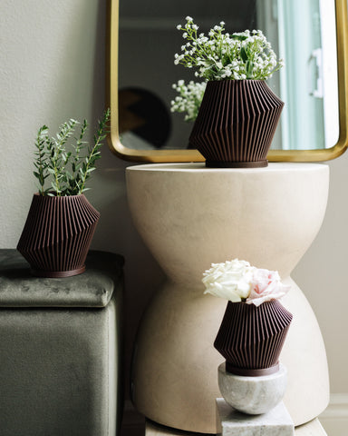 DISC brown planters by Woodland Pulse.