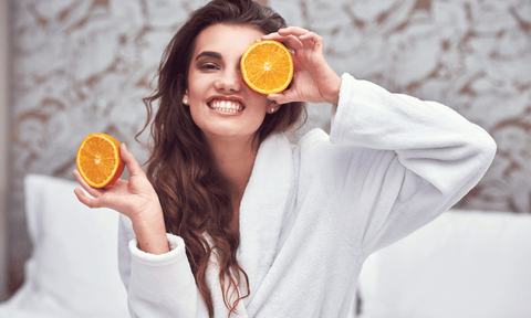 Girl Holding Oranges