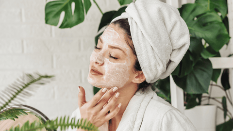 Woman Using Plant Stem Cell Skincare Product