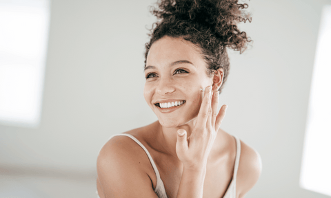 Woman Using Retinol for Skin