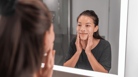 Woman Using Hot Water on Face