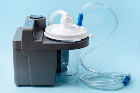 Portable aspirator used to remove mucus, blood, bodily fluids from patient.