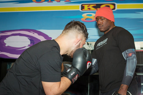 A photo of Barry Robinson training how to punch harder and faster for world level boxing